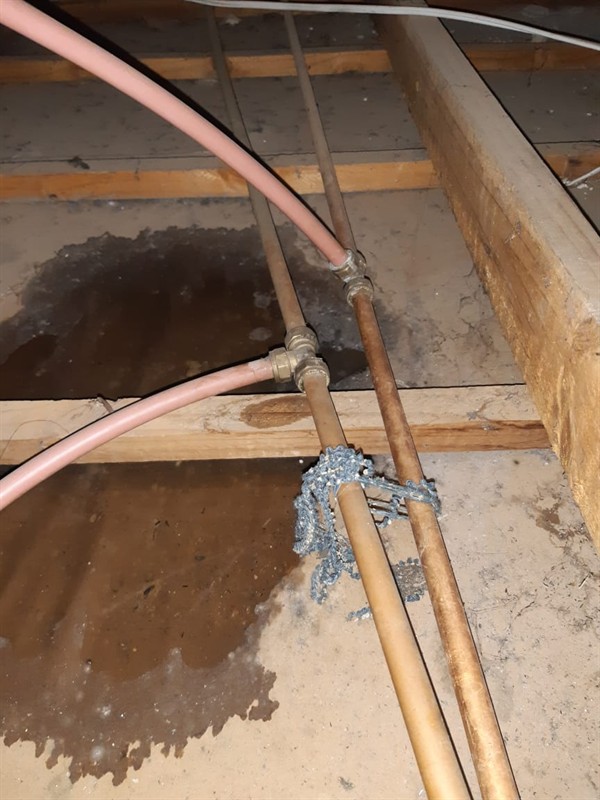 Dripping water through ceiling from burst pipe in Melrose Arch