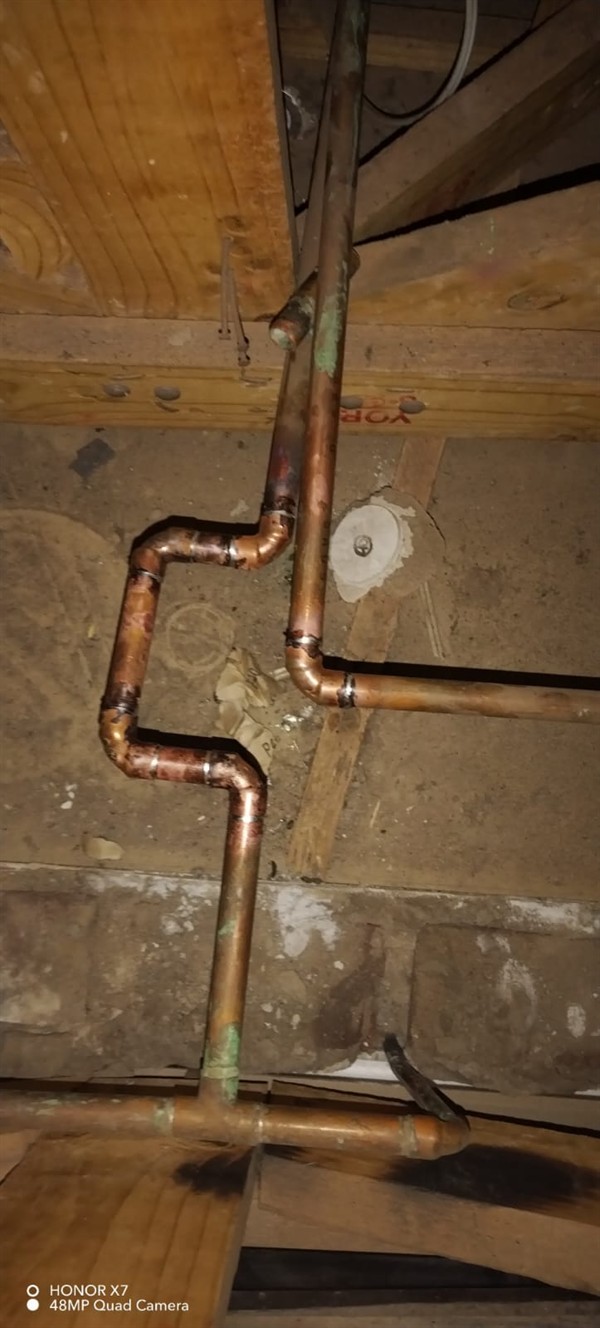 Dripping ceiling from burst pipe in Moffat View