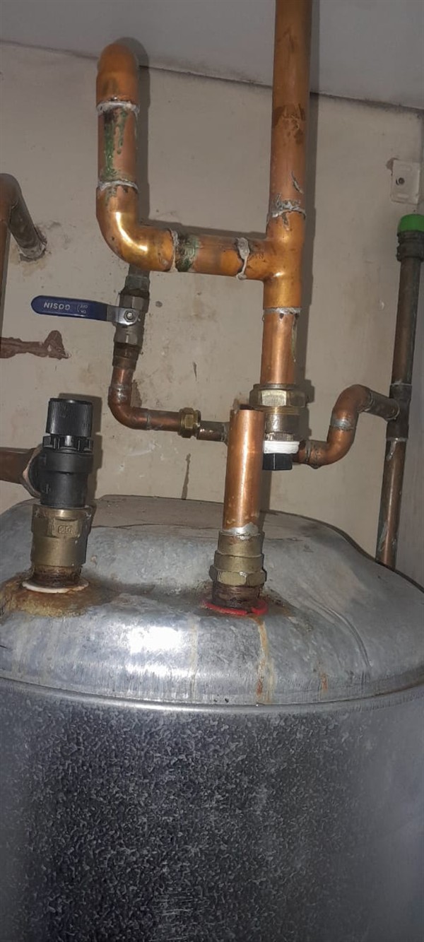 Water coming through ceiling from burst pipe in Montroux