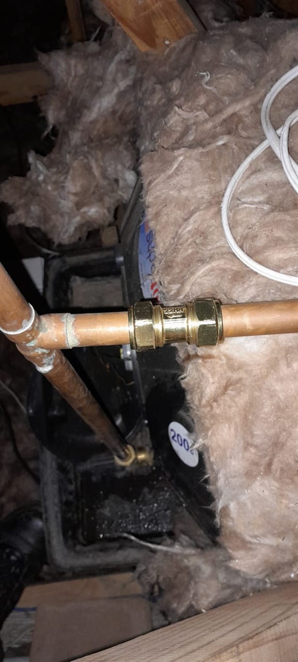 Ceiling leaking from burst pipe with visible stains in Oakdene