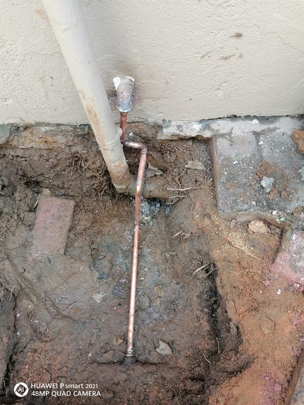 Unexplained wet spots from burst underground pipe in Rewlatch