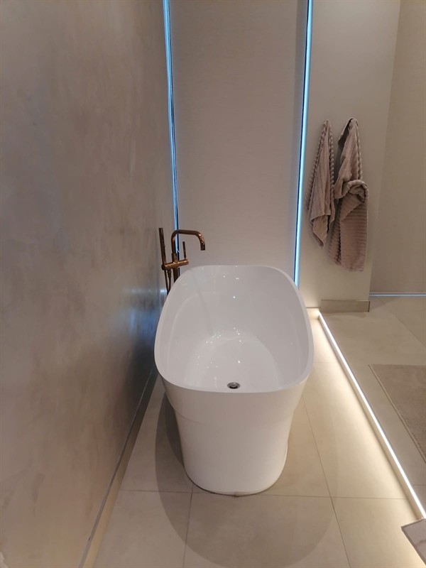 Completed bath leak repair with dry area