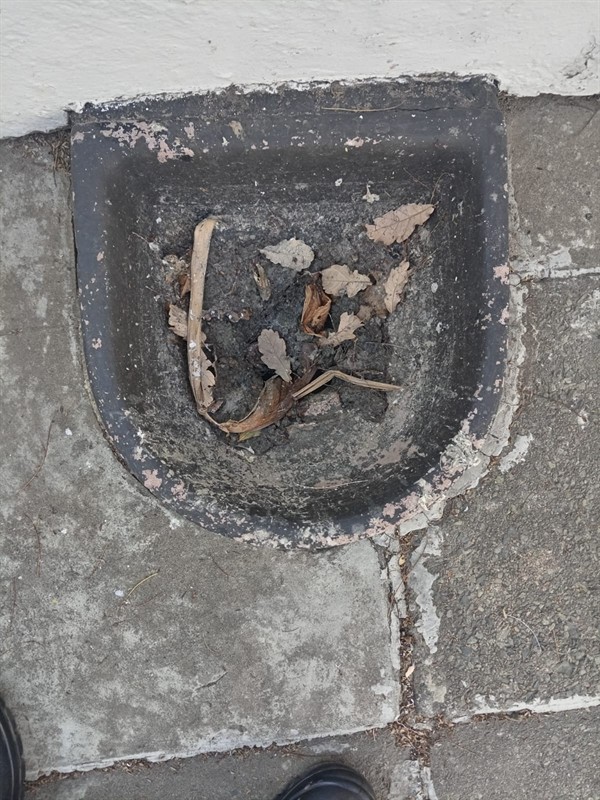 Slow drain pipe with significant water pooling