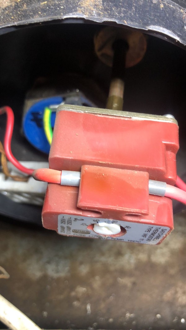 Open hot water geyser during thermostat and element repair in Hartebeesthoek with internal components visible