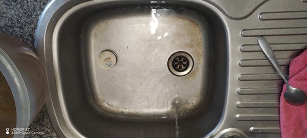 Drainage being restored on sink drain