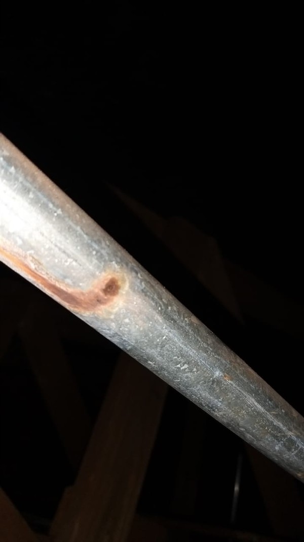 Water leaking from ceiling due to burst pipe with visible stains in Lyndhurst