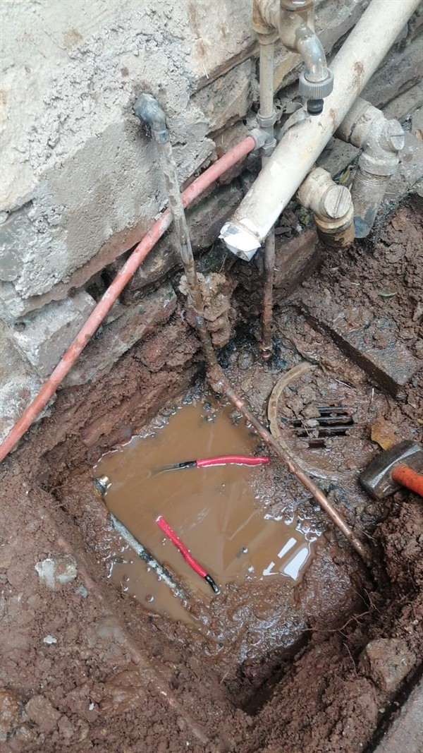 Water leaking from underground burst pipe causing higher bills in Springfield