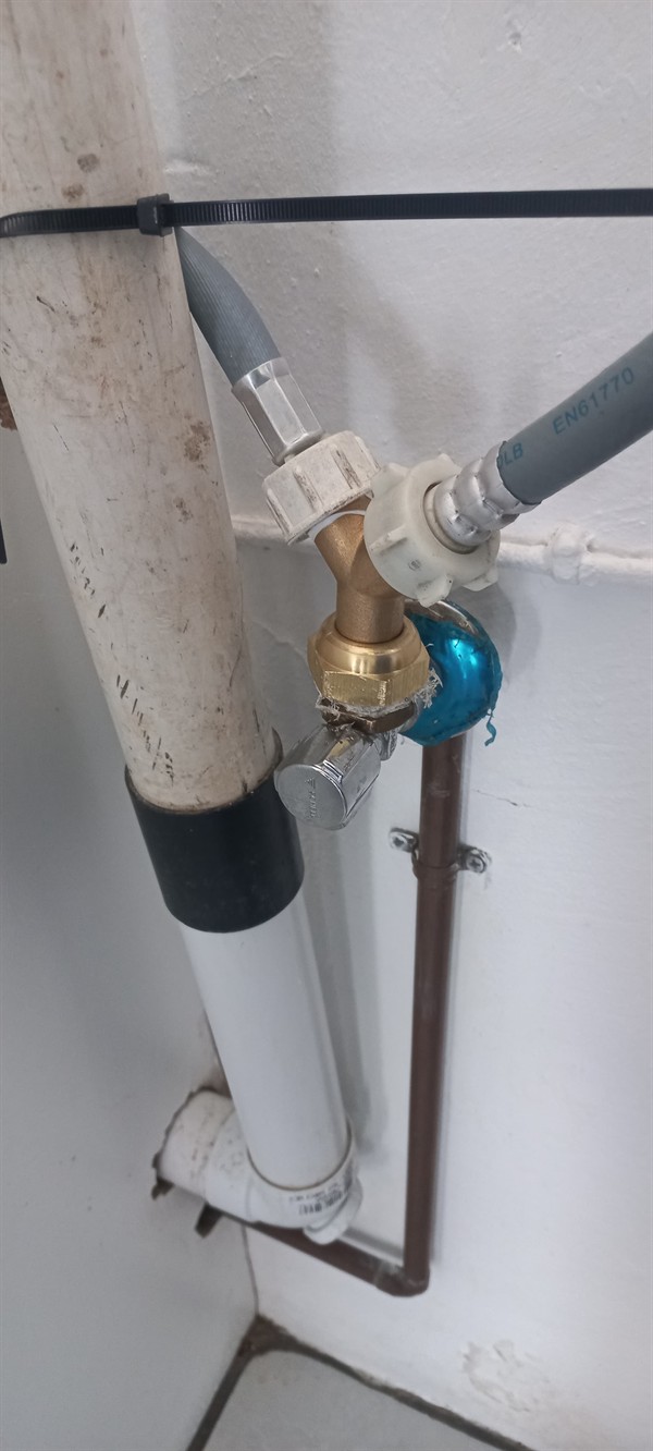 Before image of leaking washing machine angle valve