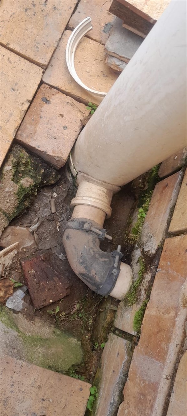 Open hot water geyser during thermostat and element repair in Broadway with internal components visible