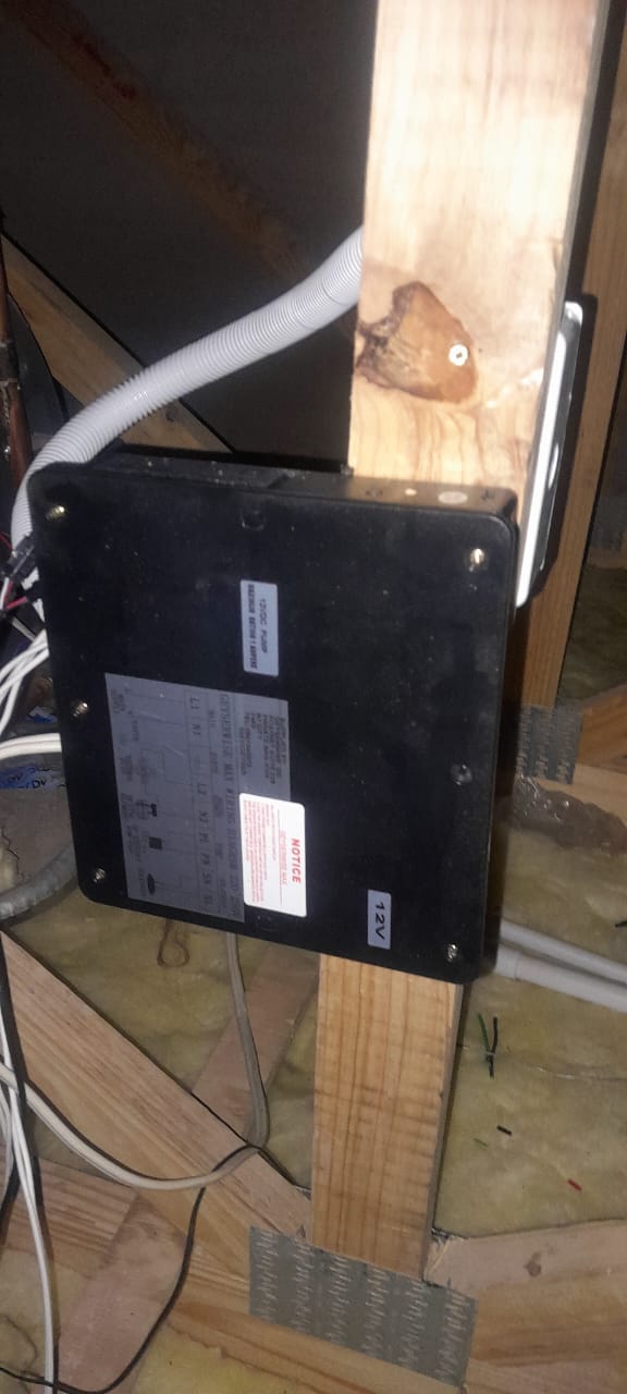 Faulty GeyserWise controller replaced in Kempton Park, showing newly installed geyser control unit mounted in ceiling with electrical wiring connected for improved temperature control and energy efficiency.