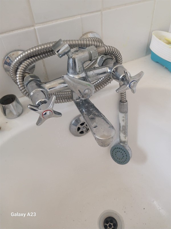 Open geyser showing heating element and thermostat repair work in De Klerkshof with exposed wiring and internal components