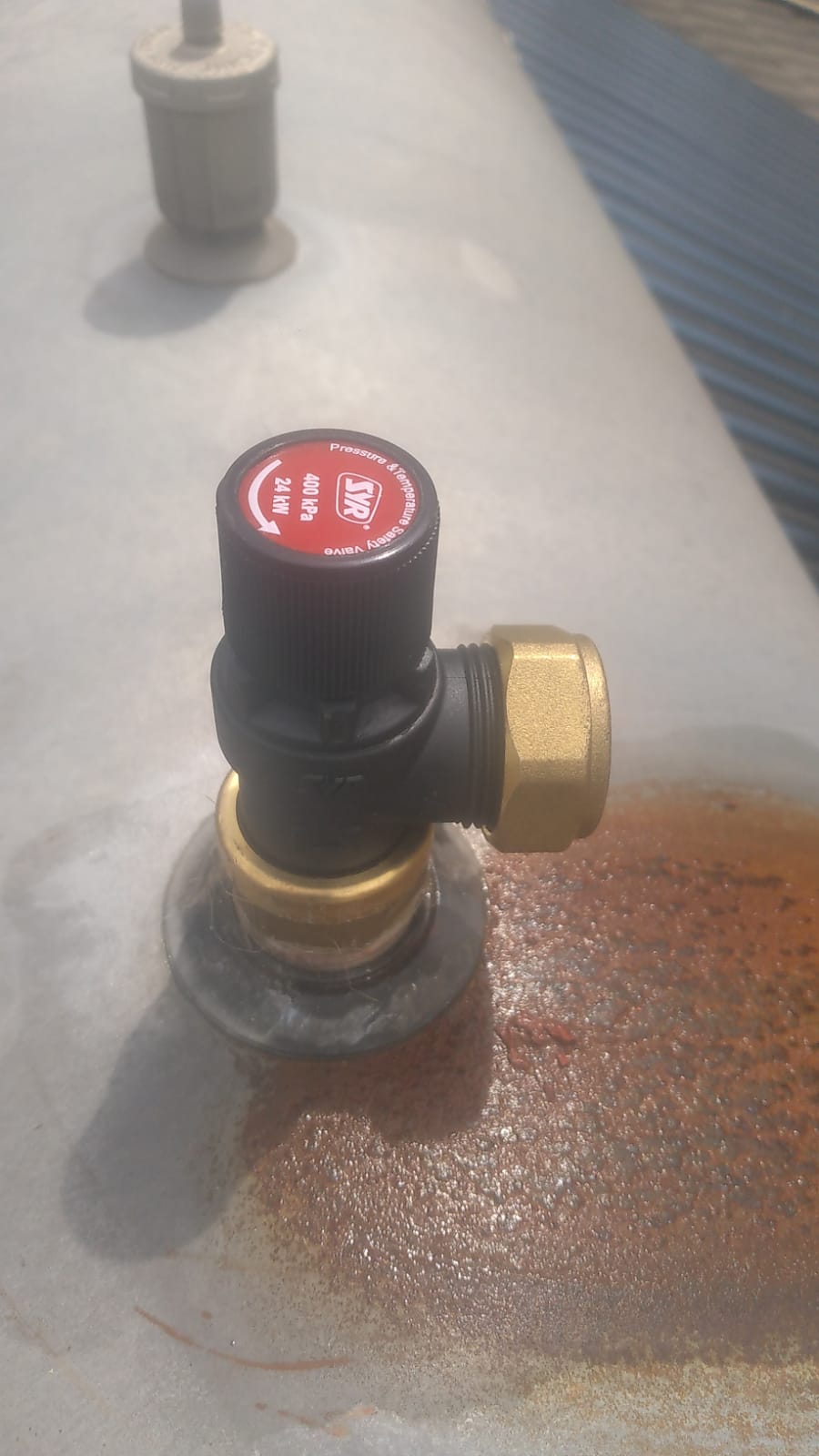 New geyser safety valve installed in Cresta, showing pressure and temperature relief valve fitted on geyser cylinder to regulate water pressure and improve system safety.