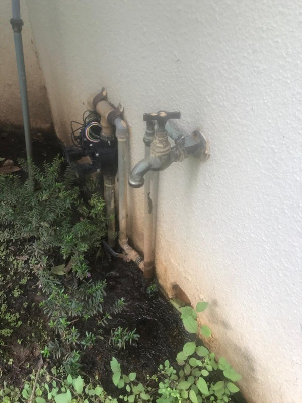 Ceiling mounted geyser opened during element and thermostat repair in Savoy Estate showing internal wiring