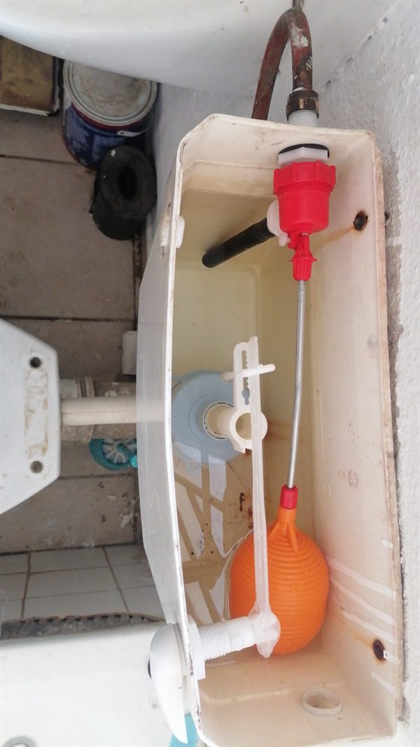 Technician repairing open geyser element and thermostat in Laser Park with exposed wiring and heating components