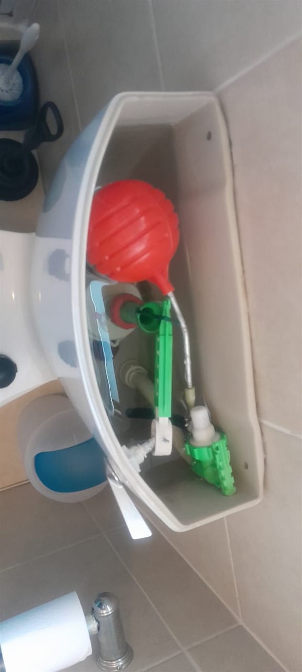 Open geyser showing heating element and thermostat repair work in Randfontein with exposed wiring and internal components