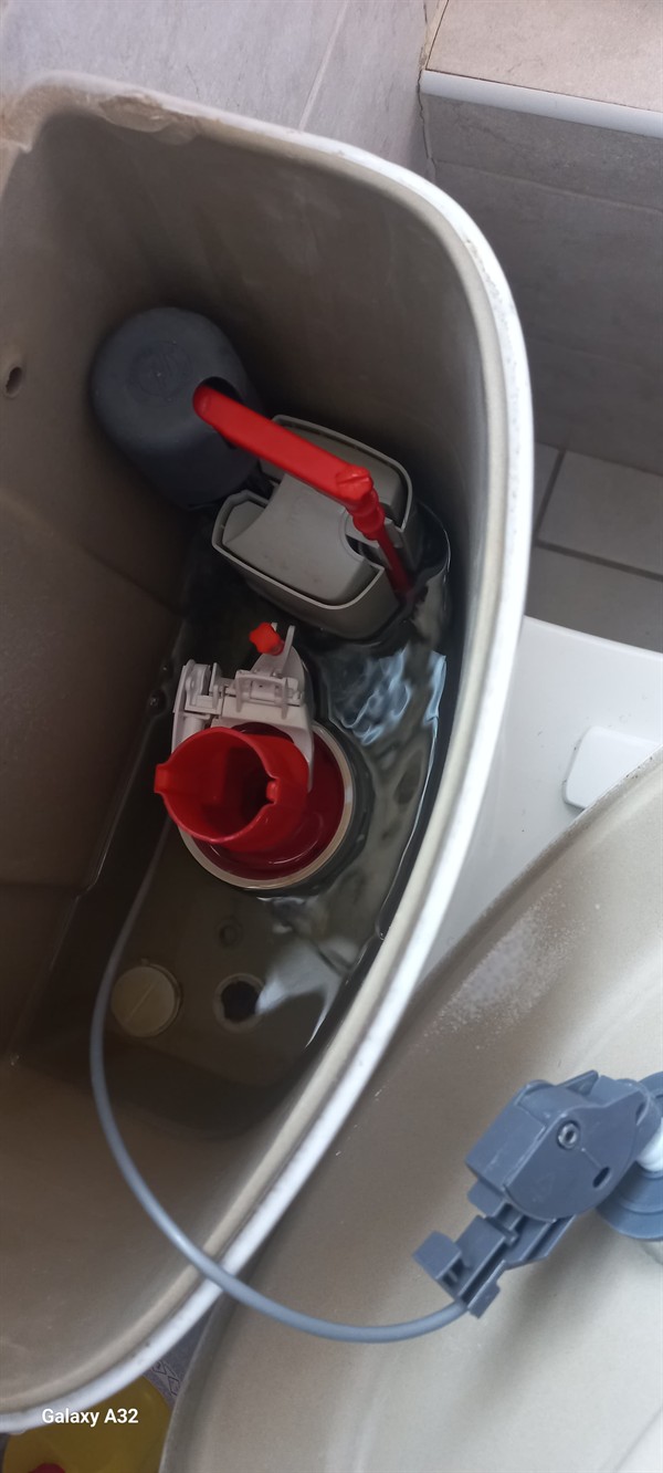 Open hot water geyser during thermostat and element repair in Vereeniging with internal components visible