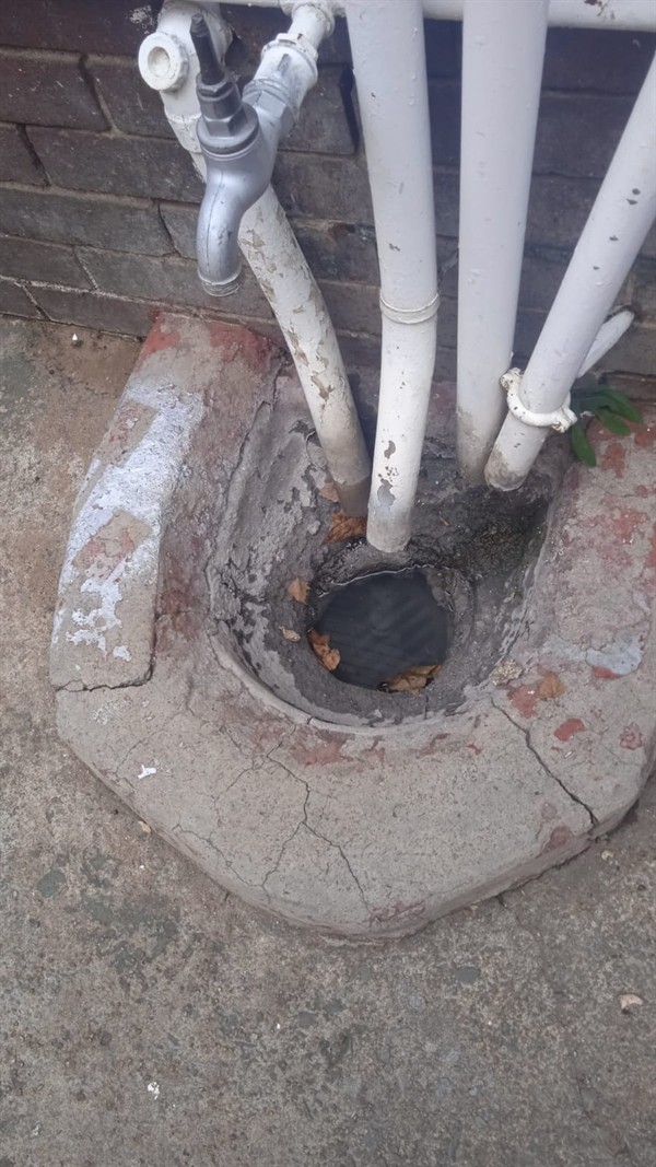 Gulley with standing water due to blockage in Germiston Central