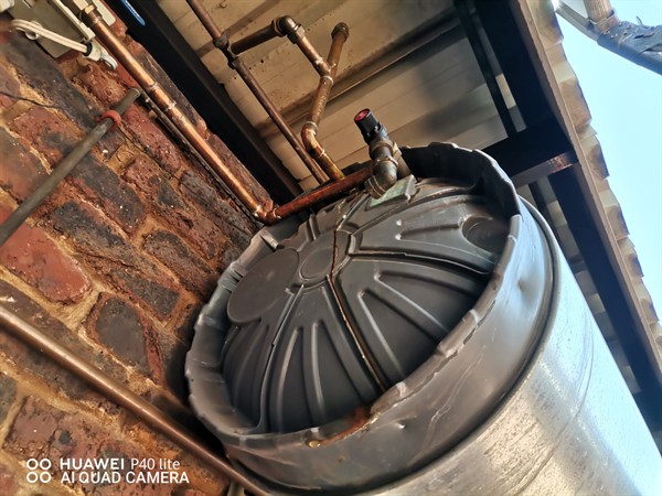 Rapid escaping water from burst geyser unit in Braamfonteinspruit