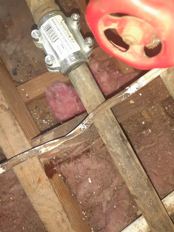 Ceiling damage from burst pipe leak in Montclare