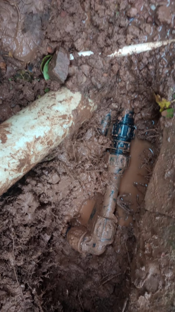 Water escaping from underground burst pipe causing damp areas in Turffontein West
