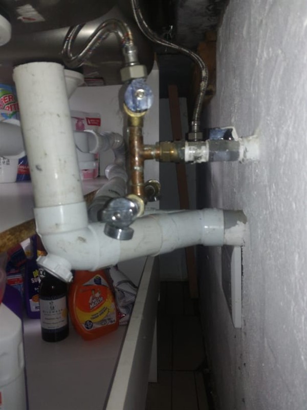 View of dripping basin angle valve under sink in Akasia Golf Course