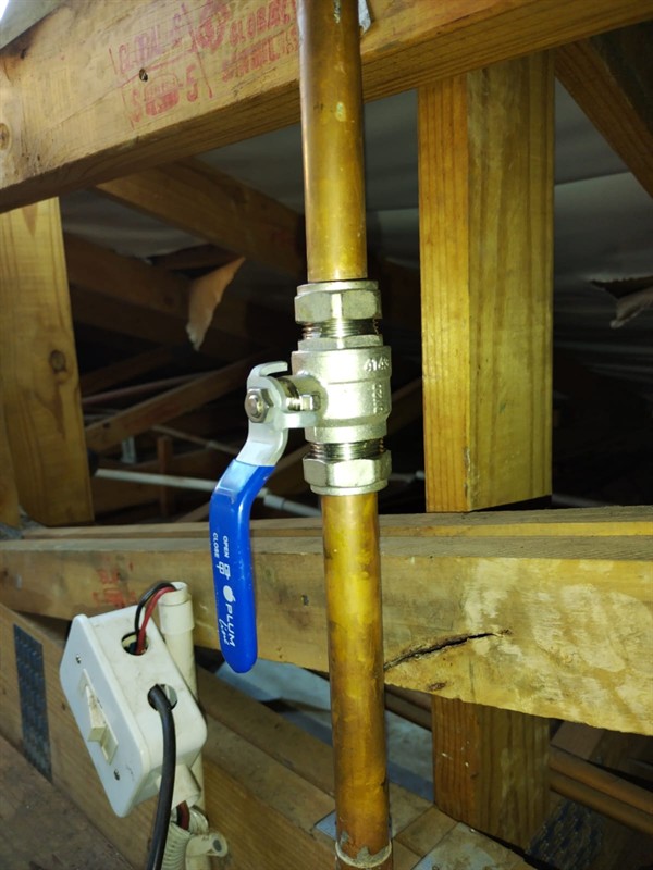 Damaged geyser angle valve showing the leak point