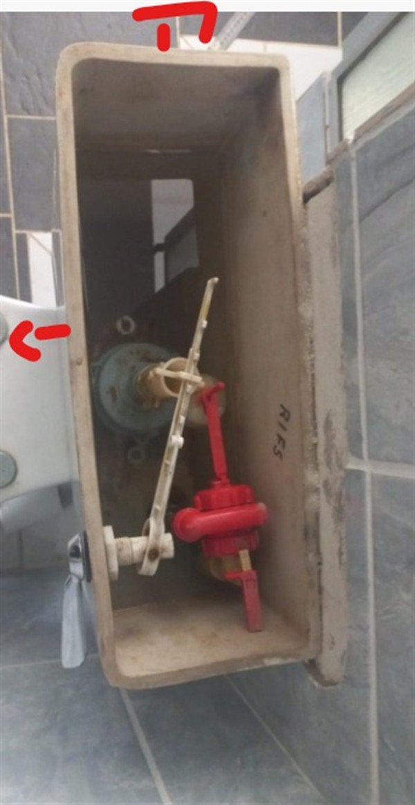 Open geyser showing heating element and thermostat repair work in Fulcrum with exposed wiring and internal components