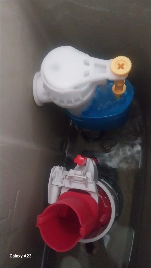 Open geyser showing heating element and thermostat repair work in Petersfield with exposed wiring and internal components