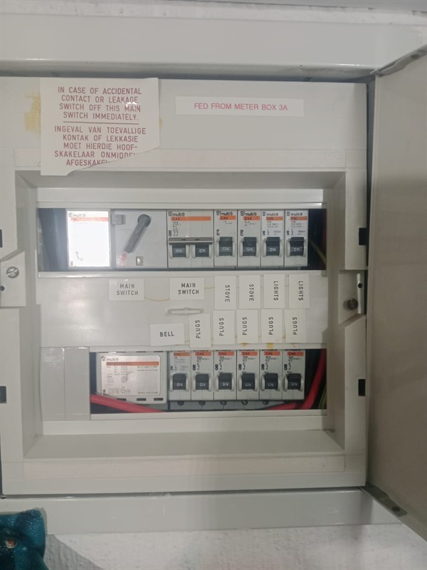 Faulty geyser element and thermostat repair in Brushwood Haugh with open Geyser and visible components