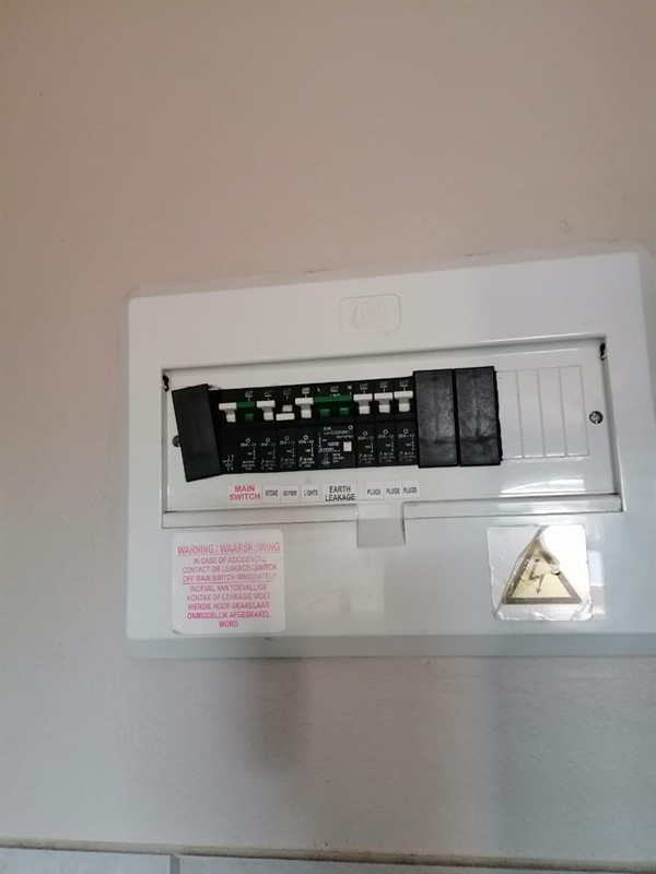 Faulty geyser element and thermostat repair in Kelvin with open Geyser and visible components