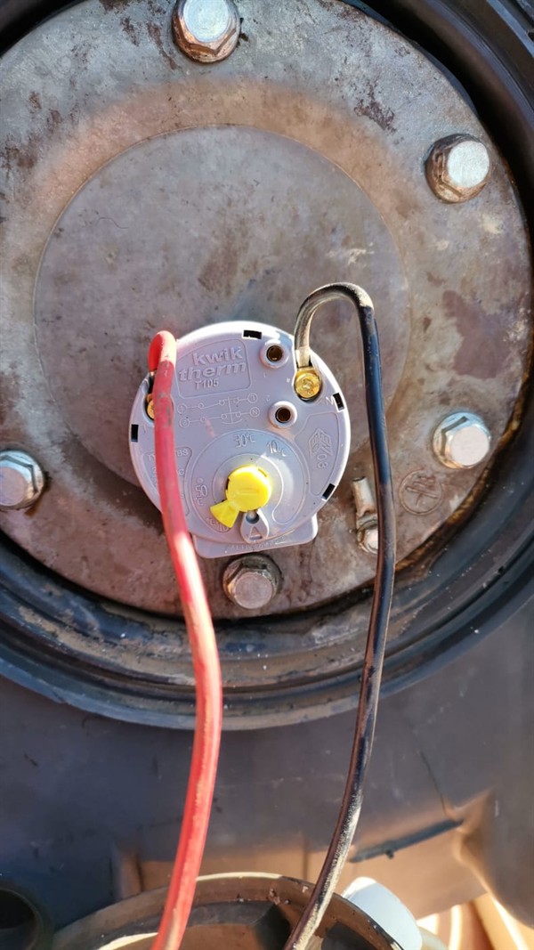 Open geyser showing heating element and thermostat repair work in Meyersdal with exposed wiring and internal components
