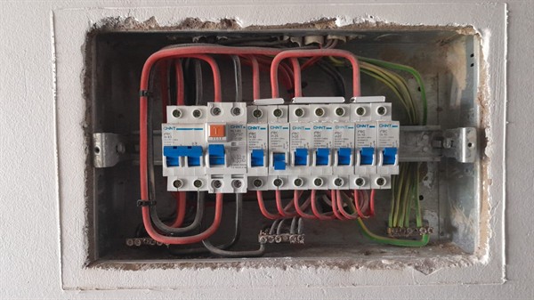 Technician repairing open geyser element and thermostat in Lilianton with exposed wiring and heating components