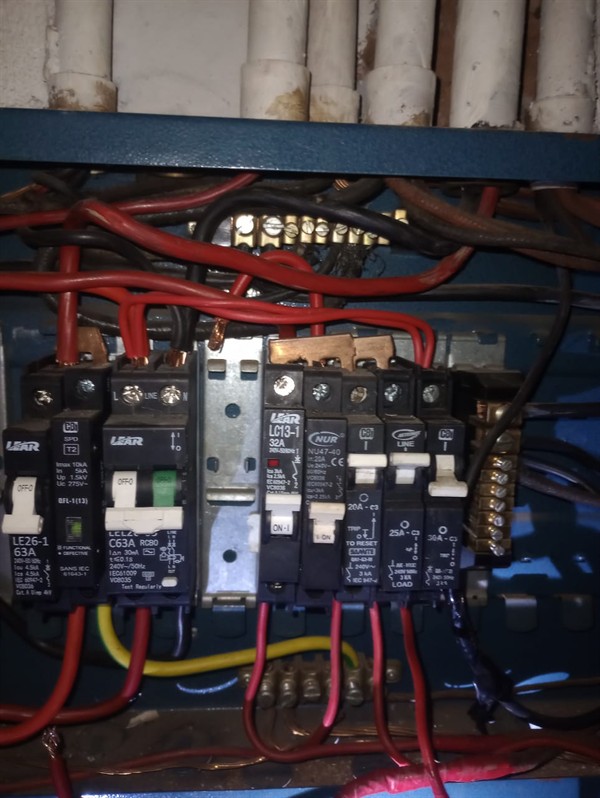 Faulty geyser element and thermostat repair in Kanana Village with open Geyser and visible components