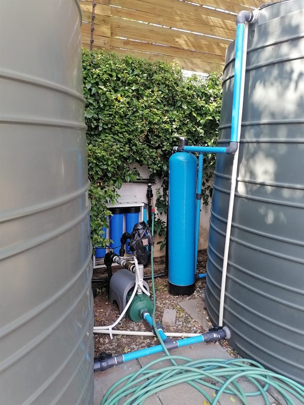 Technician repairing open geyser element and thermostat in Hennopsmeer with exposed wiring and heating components