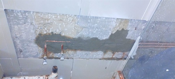 Dripping water through wall from burst pipe in Kempton Park Central