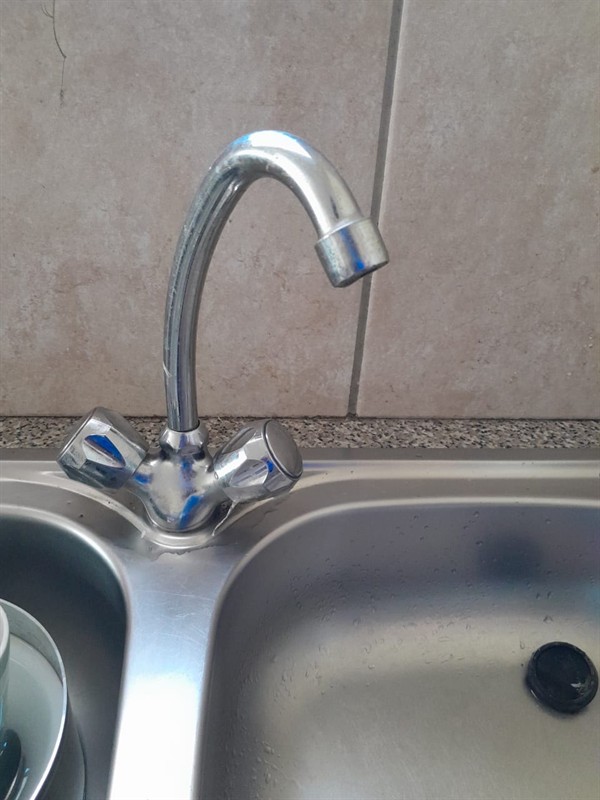 Ceiling mounted geyser opened during element and thermostat repair in Wilbert showing internal wiring