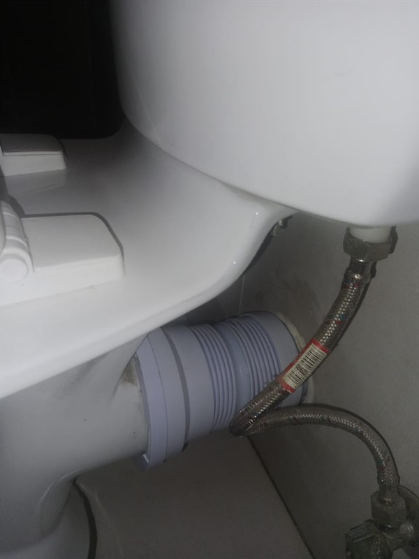 Damp floor from leaking toilet valve