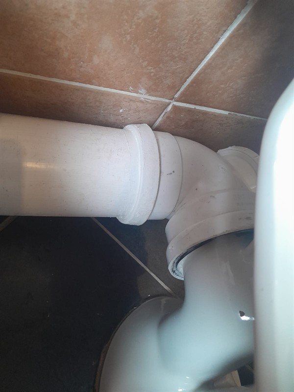 Technician repairing open geyser element and thermostat in Noordheuwel with exposed wiring and heating components