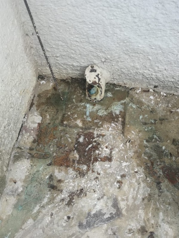 Deep clog in drain pipe causing severe slow drainage