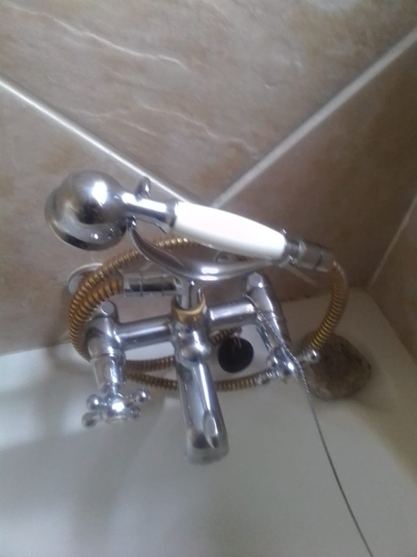 Technician repairing open geyser element and thermostat in Florida View with exposed wiring and heating components