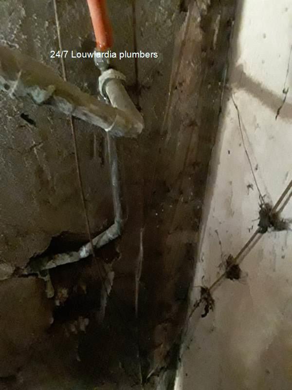 24/7 Louwlardia plumbers working on a pipes