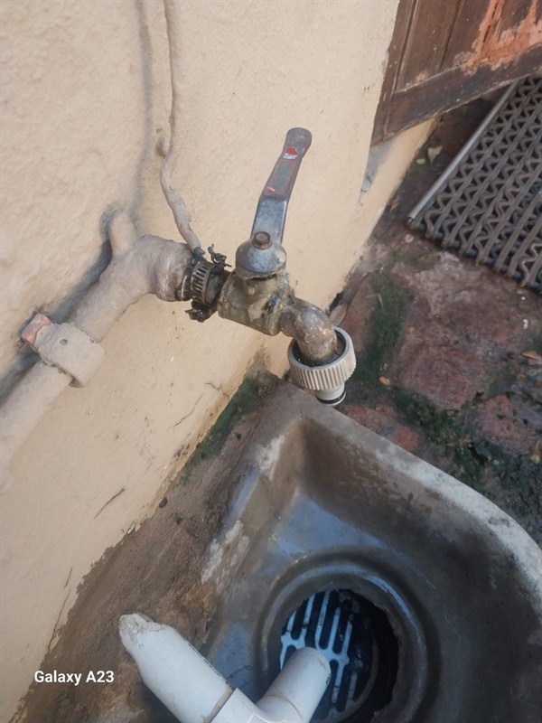 Drain blockage in the process of being cleared