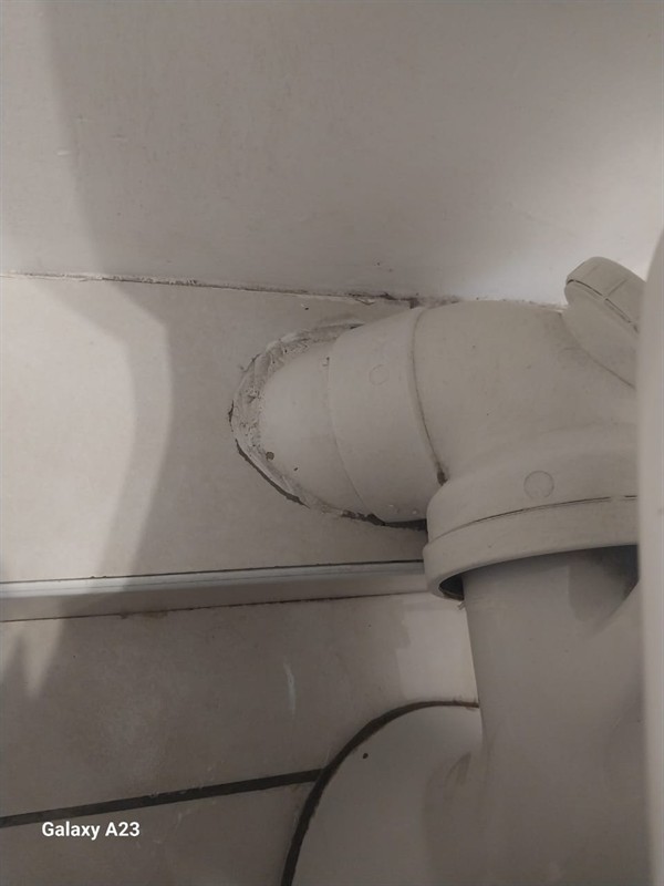 Ceiling mounted geyser opened during element and thermostat repair in Kempton Park Central showing internal wiring