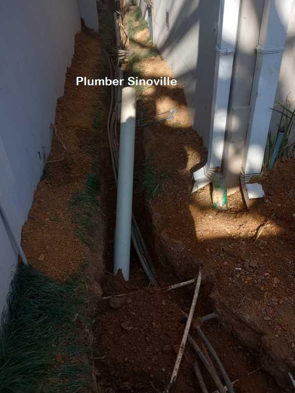 Plumber Sinoville repairing plumbing systems in Sinoville