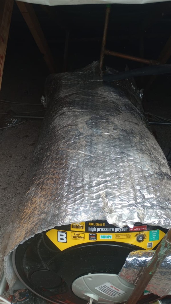 Badly flooding cupboard from burst geyser in Randridge