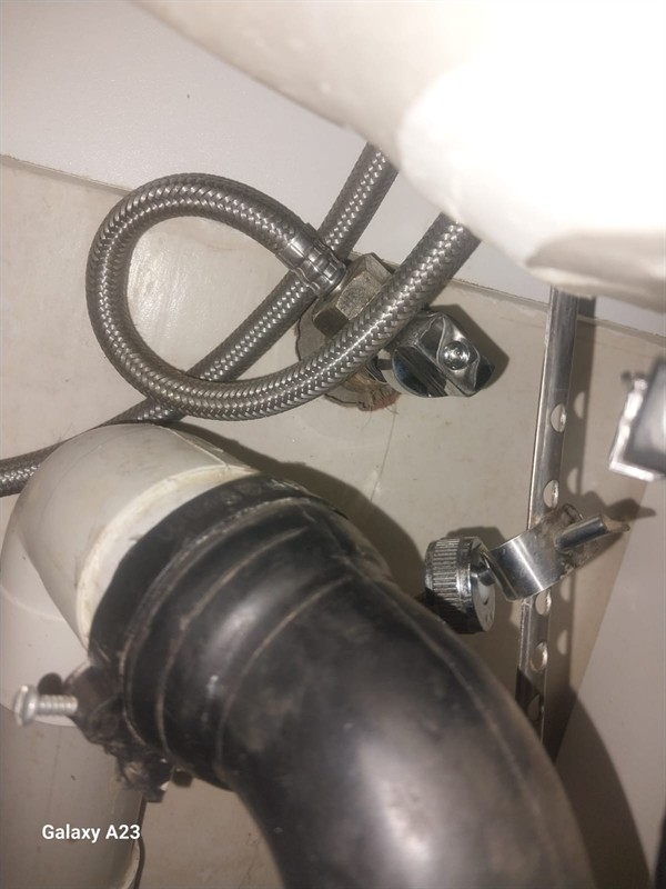 Leaking connection on basin flexi pipe in Faraday