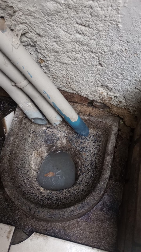 Blocked drain during professional repair work