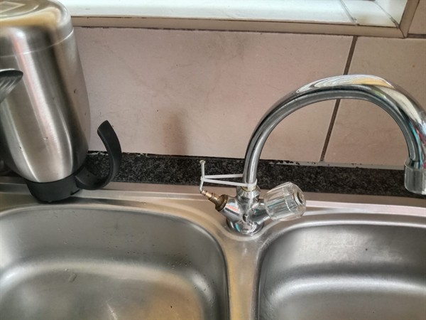 Complete clearing of sink drain blockage