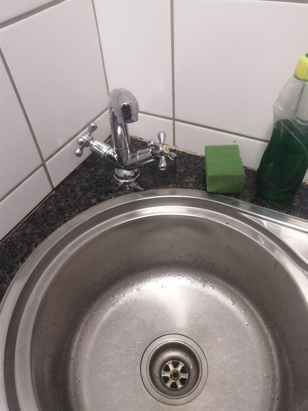 Slow sink drain with water pooling