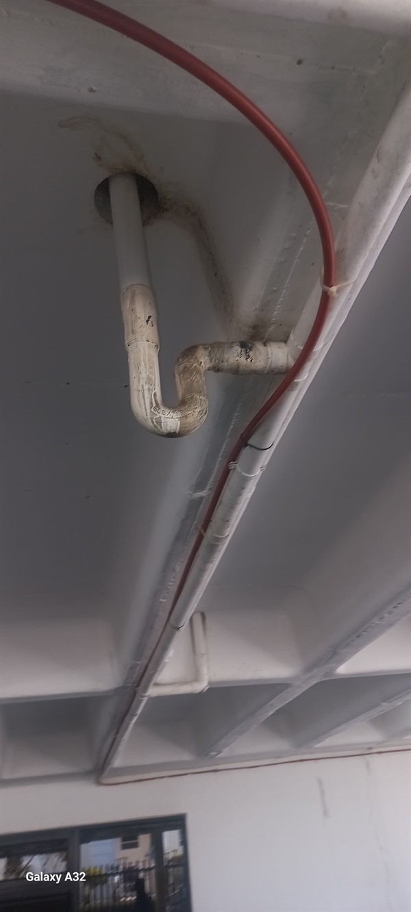 Spraying water from burst outside pipe in West Rand